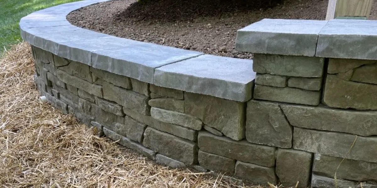 Will a retaining wall solve my drainage problems?